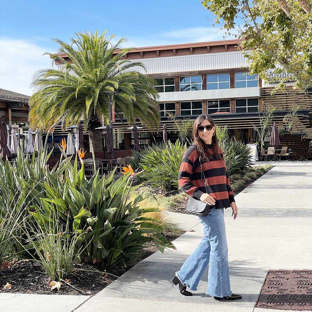 striped sweater and flare jeans