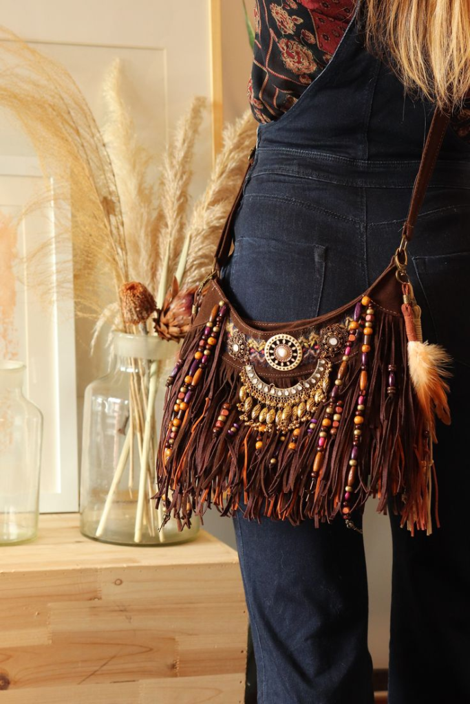 Bohemian style brown leather shoulder bag with fringe and beaded details, 1960s - 1970s hippie fashion