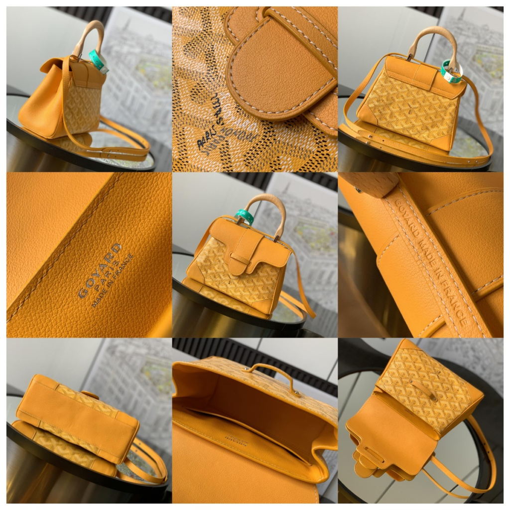 Close-up views of the AAA Goyard Saïgon Mini replica in Mustard Yellow (Jaune), highlighting the real beechwood handle craftsmanship, silver hardware, and crisp logo stamping on Taurillon leather.