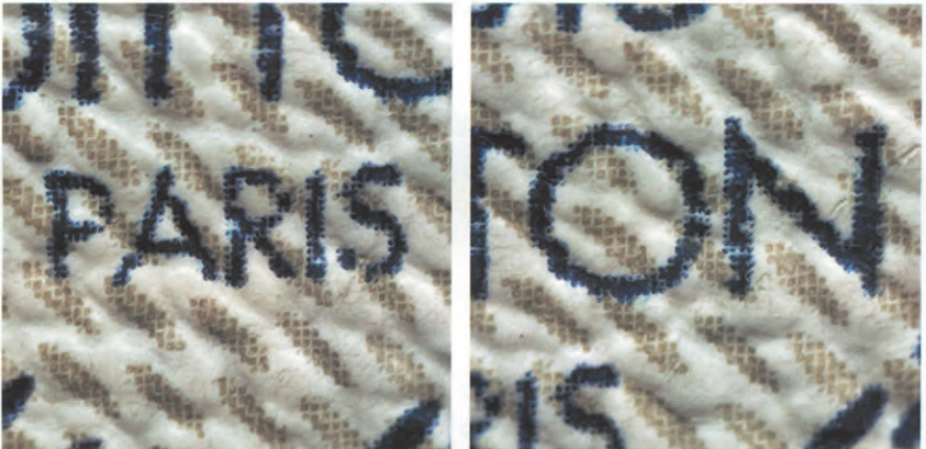 Close-up of genuine Damier Canvas “PARIS” and “TON” lettering showing stepped font edges for real vs fake LV bag authentication.