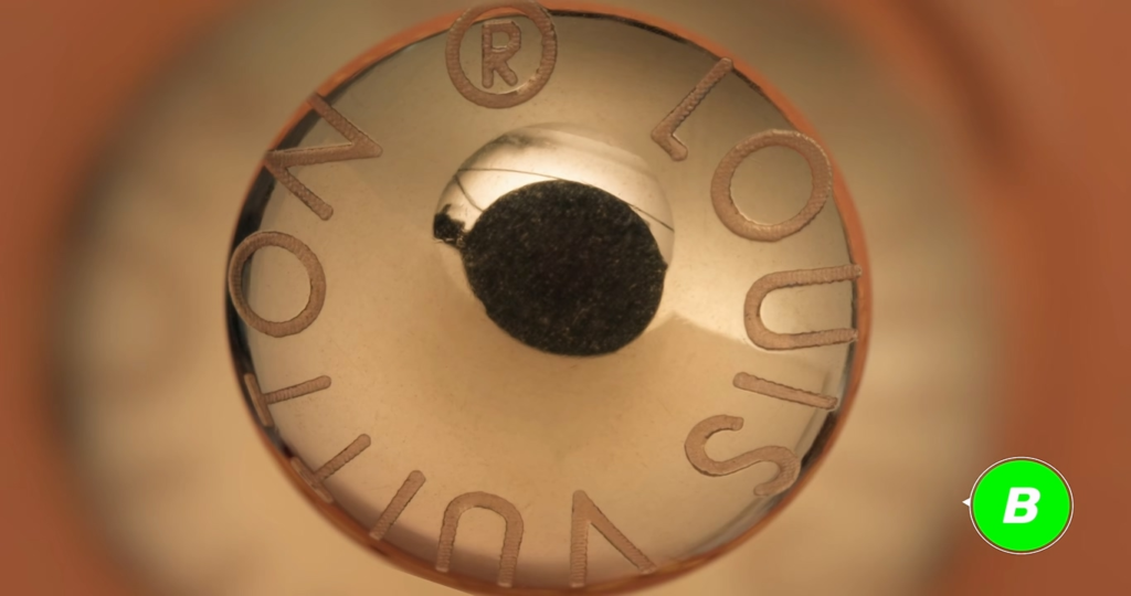 Macro comparison of Tier A and B replica hardware showing standard internal hex screws with concentric circle marks and incorrectly placed gear teeth on the rivet rather than the base, marked with a red X for structural failure.